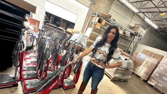 In the warehouse with supplies.