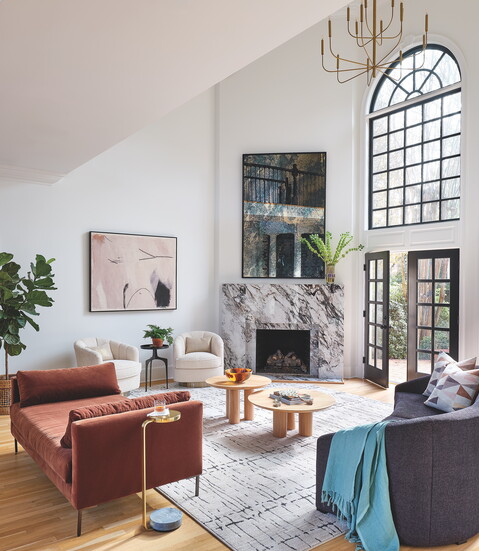 Hill keeps the fireplace the focal point with this Acid Wash Floor Mirror from Four Hands 