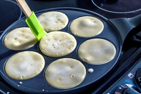 Plättar (Swedish mini-pancakes) are made in a special pan