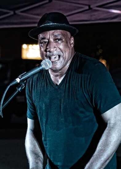 As the sun goes down, popular performers such as Erik Blue turn up the heat at the Summer Concert Series at the Streets.