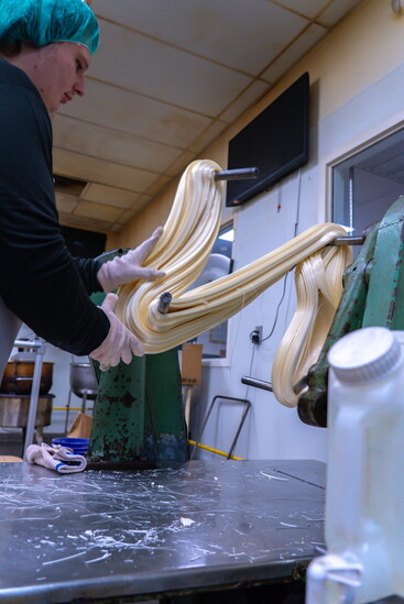 Doscher's light & airy candy canes start as a fifty-pound blob of cooked sugar that gets pulled & stretched until it turns silky white.