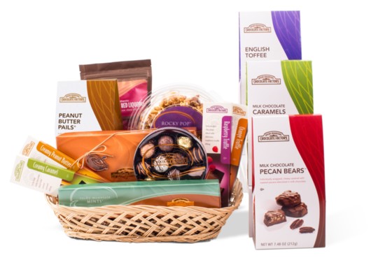 Indulgence Gift Basket includes English toffee, Brown Bear, Peanut Butter Pails, Caramels Tote, Rocky Mountain Mints, truffle/chocolate/caramel bars and more.