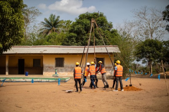 Crews work to install the water wells in Africa.