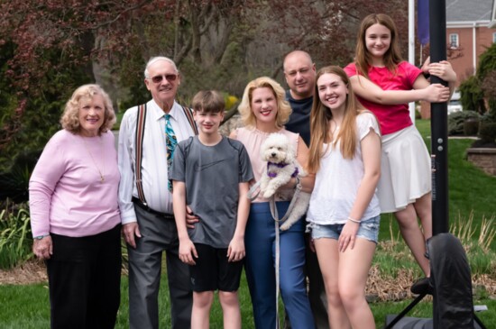 Lawrence with her parents, Carol and Gerald, husband John Benvenuto, children Abigail Lawrence and Amelia and Lawson Benvenuto, and dog, Libby 
