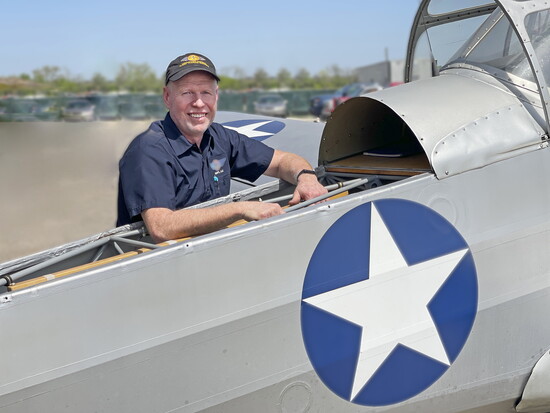 Butler County Warbirds Museum Founding Member Tim Epperhart with their Fairchild PT-19. Flights in this aircraft are available for purchase.