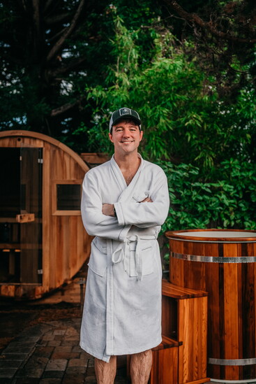 Redwood Outdoors co-founder Killian Lannen with one of the brand’s saunas and cold plunges