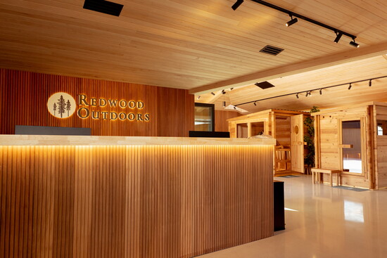The showroom’s warm, cedar-lined entryway
