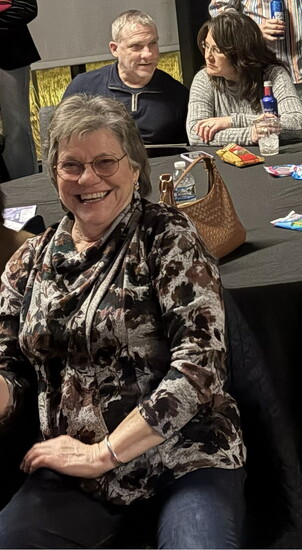 Zoe Perkins and Jim and Michelle Hankinson in the background