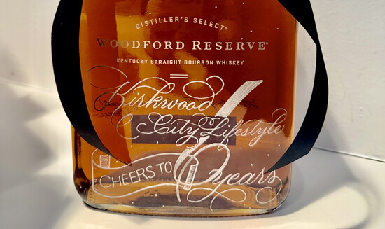 Custom engraved botttle designed by artist Leah Spiros, owner of Wrapped and Written