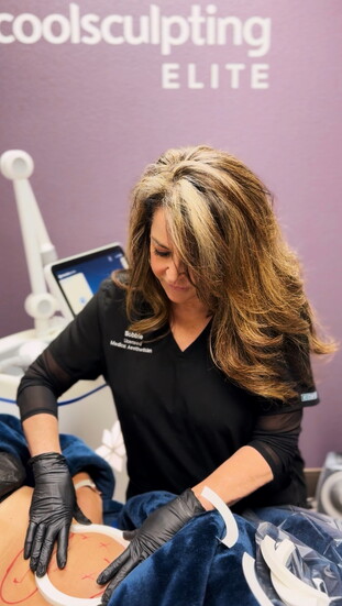 Provider Bobbie Marriott CoolSculpting a patient at Allura