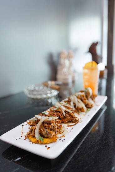 Vaca Frita over Tostones