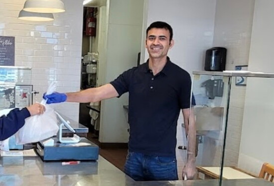 Fahad Siddiqui greets guests at Al Hamra’s original Redondo Beach location.
