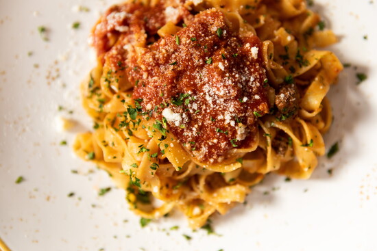 Enjoy the authentic taste of Italy with dishes like Tagliatelle alla Bolognese served fresh at Pellegrini Cucina Italian. Taylor Nicole Photography
