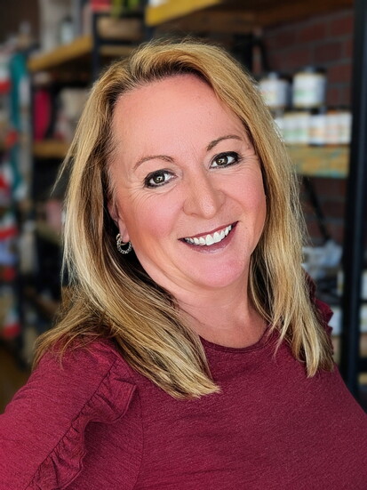 Amanda Hiller, proud owner of The Bottled Olive.