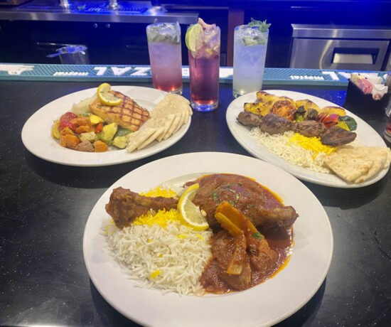 Lamb Osso bucco, Pomegranate Glazed Salmon and chicken and beef shishkabobs at Zorba's.