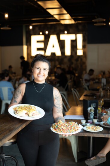 General Manager Brit shows off popular entrees!