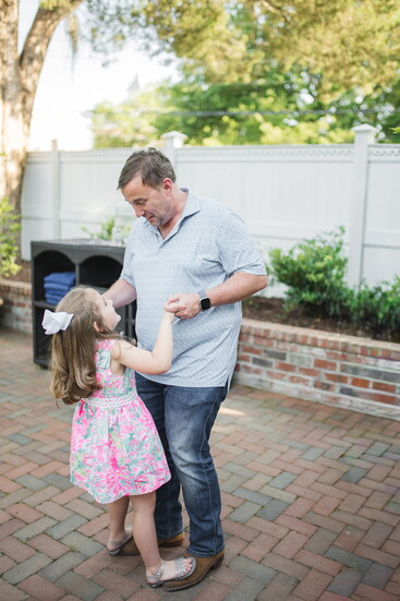 Bradley McMillian dancing with is daughter