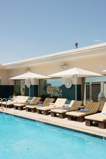 Poolside relaxation at the rooftop pool of Hotel Contessa