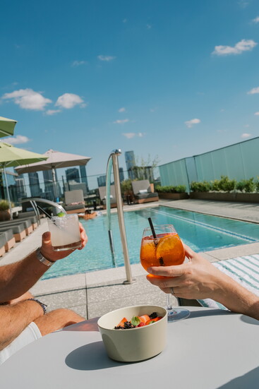 Unwind with snacks and poolside cocktails at The Loren