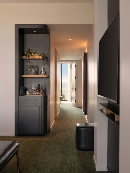 Take a breather in your room with a fully stocked minibar at The Loren