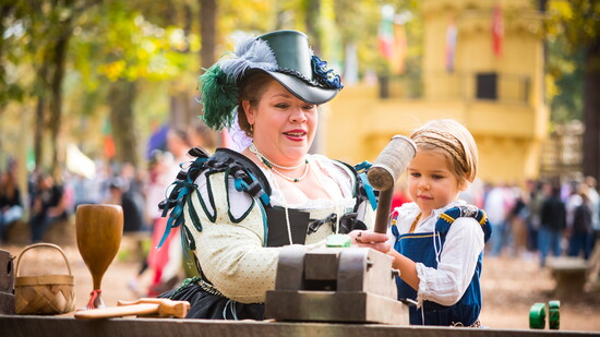Festival guests enjoy hands-on crafts as tradition comes alive for every age.