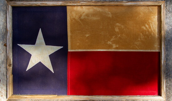 A framed Lone Star Flag brings texture and unmistakable Texas character to the familiar design.