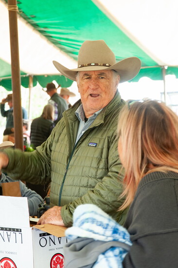 Hever enjoys playing host at the sale, and highlights local wine and businesses - Photo by Brent Ryan Burgess