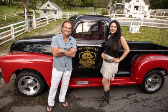 Marc and Krista Marie Oswald pose before their classic TGL Farms truck.