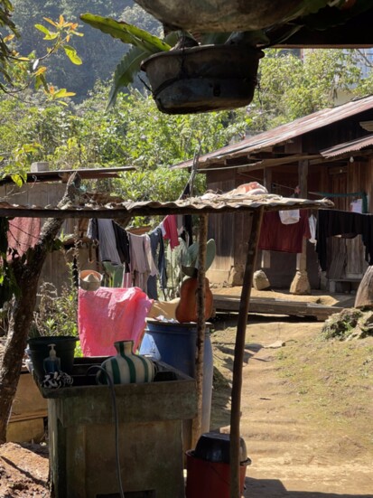 Homes in Guatemala are usually no more than boards and and unattached tin roof. 