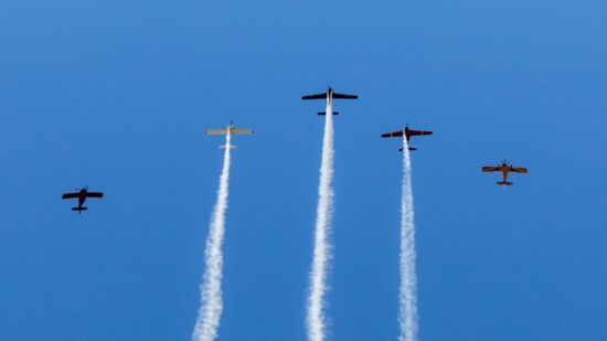 Vintage warbirds soar over the 2023 Hendersonville Veterans Day parade.