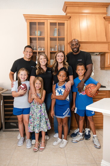 Brooke Yobo and Lindsay Keyser with their families