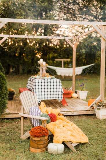 The layered pumpkins and yellow blanket are made by Sweet Tea Blankets, they can be purchased at Hamilton Rae.