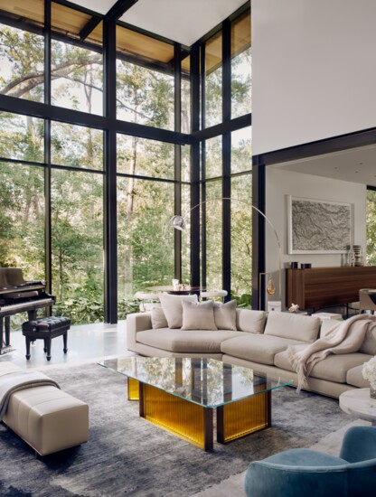 Floor-to-ceiling windows create the peaceful sensation of "living in the view."