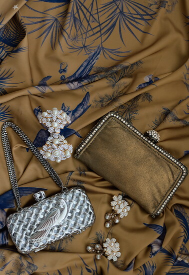 Clara Kasavina handbags. Larry Vrba bracelet and earrings. 