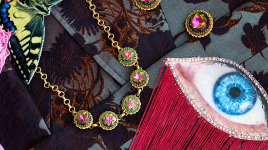 Butterfly and eye pieces by Ellen Macomber from New Orleans. 1950s Schiaparelli arrings, necklace and bracelet from Cindy's  husband’s grandmother.