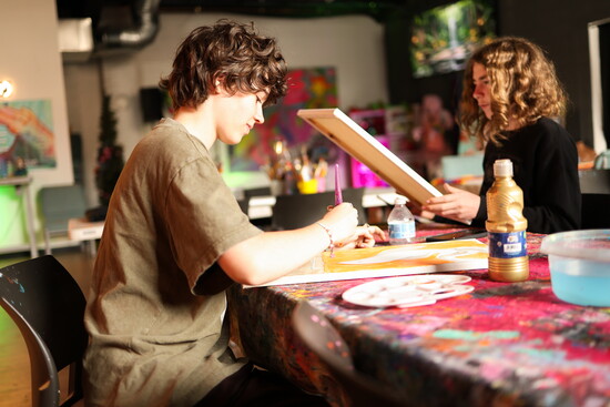 Painting is just one of the arts kids can explore at HUE. Photo credit: Hillary Christen