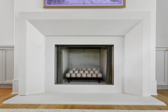 Solid cast concrete mantles offer a unique, bold fireplace design.