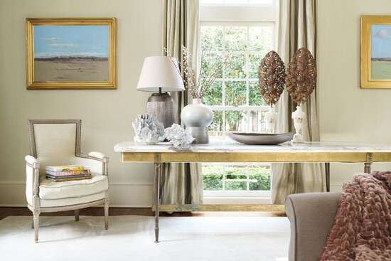 Below: A porcelain vase and bowl by Rina Menardi, which can be found at Circa Birmingham, rest on an antique marble-topped bronze table from CIIRCA Antiques. 