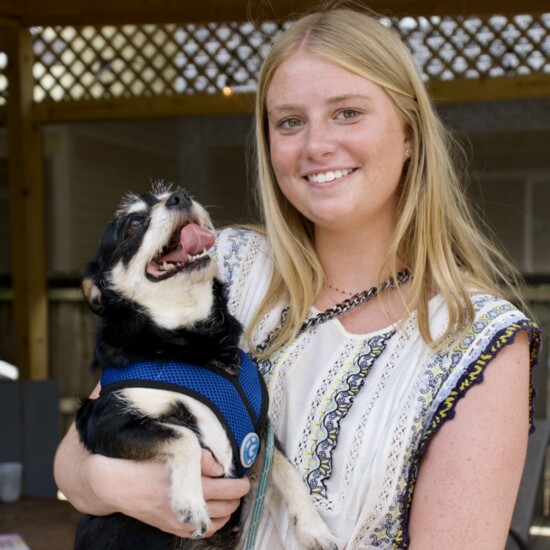 River City Lifestyle Intern, Katherine Redd, with a happy pup.