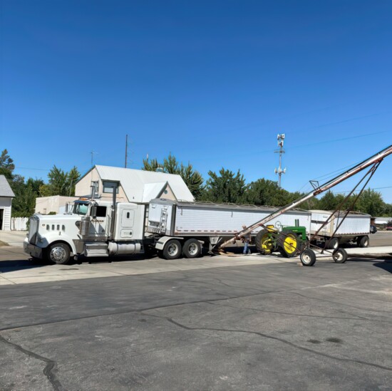 Two silos receive regular shipments of wheat