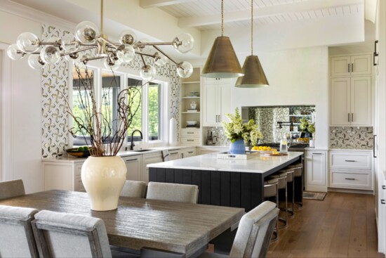 A large open kitchen and dining area is perfect for hosting dinner parties.
