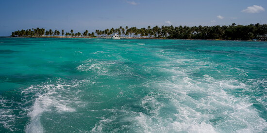 Approaching Blackbird Caye Resort after a lively boat ride from Belize City