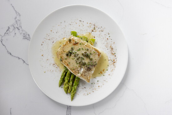 Photo Credit: Lauren Holub Photography Halibut with Asparagus Caper Piccata Sauce