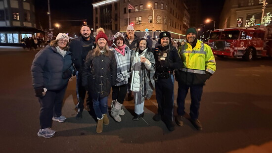 Chapman and friends on the streets of Asbury Park at Christmas