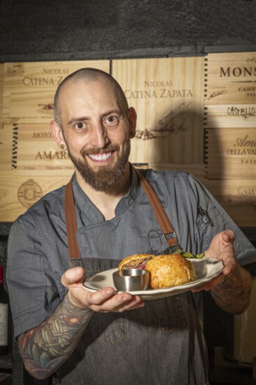 Executive Chef Daniel Gibb with the Chalkboard Wellington, their signature dish. 
