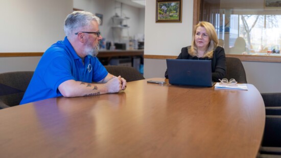 Amanda and Wade discussing local business