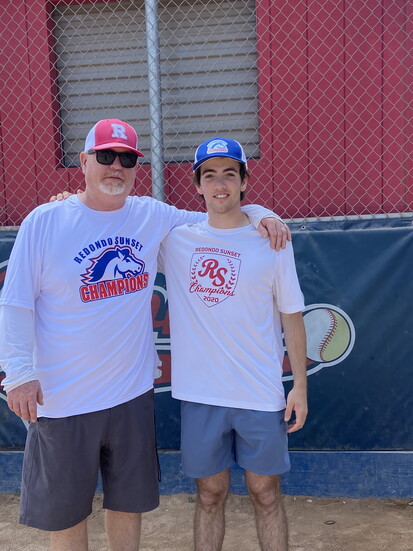 Proud dad Chris with son and Champions League founder, Matthew McCauley.