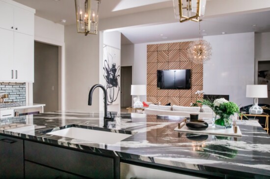 The dramatic island countertops are eye-catching. 