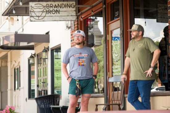 Another look from the front of Adam and Keath in the custom Tees and caps only found at Branding Iron. 