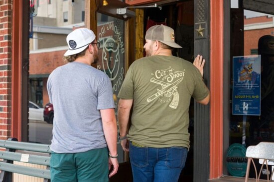 Custom tee shirts in the popular tri-blend material and caps are designs found only at Branding Iron. 